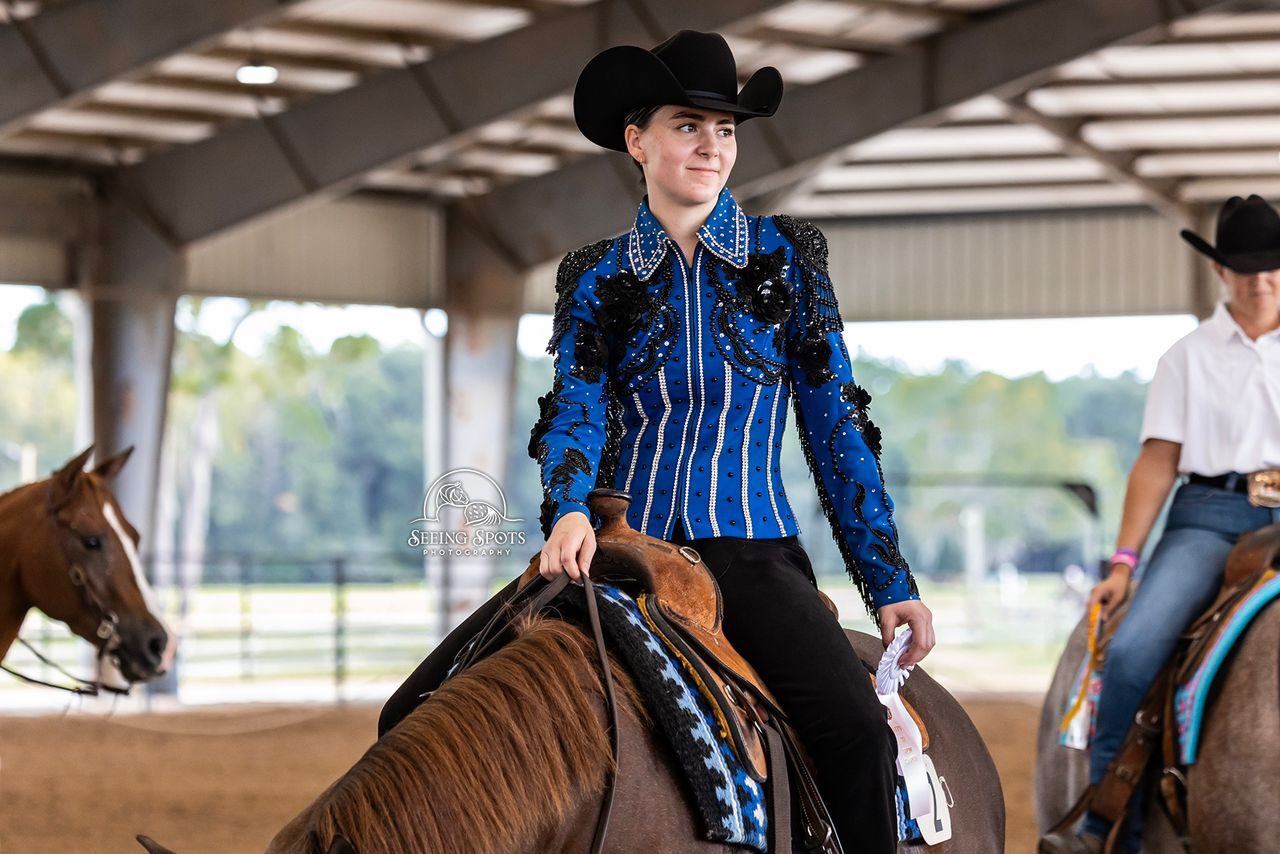 Western exhibitor in a blue show shirt